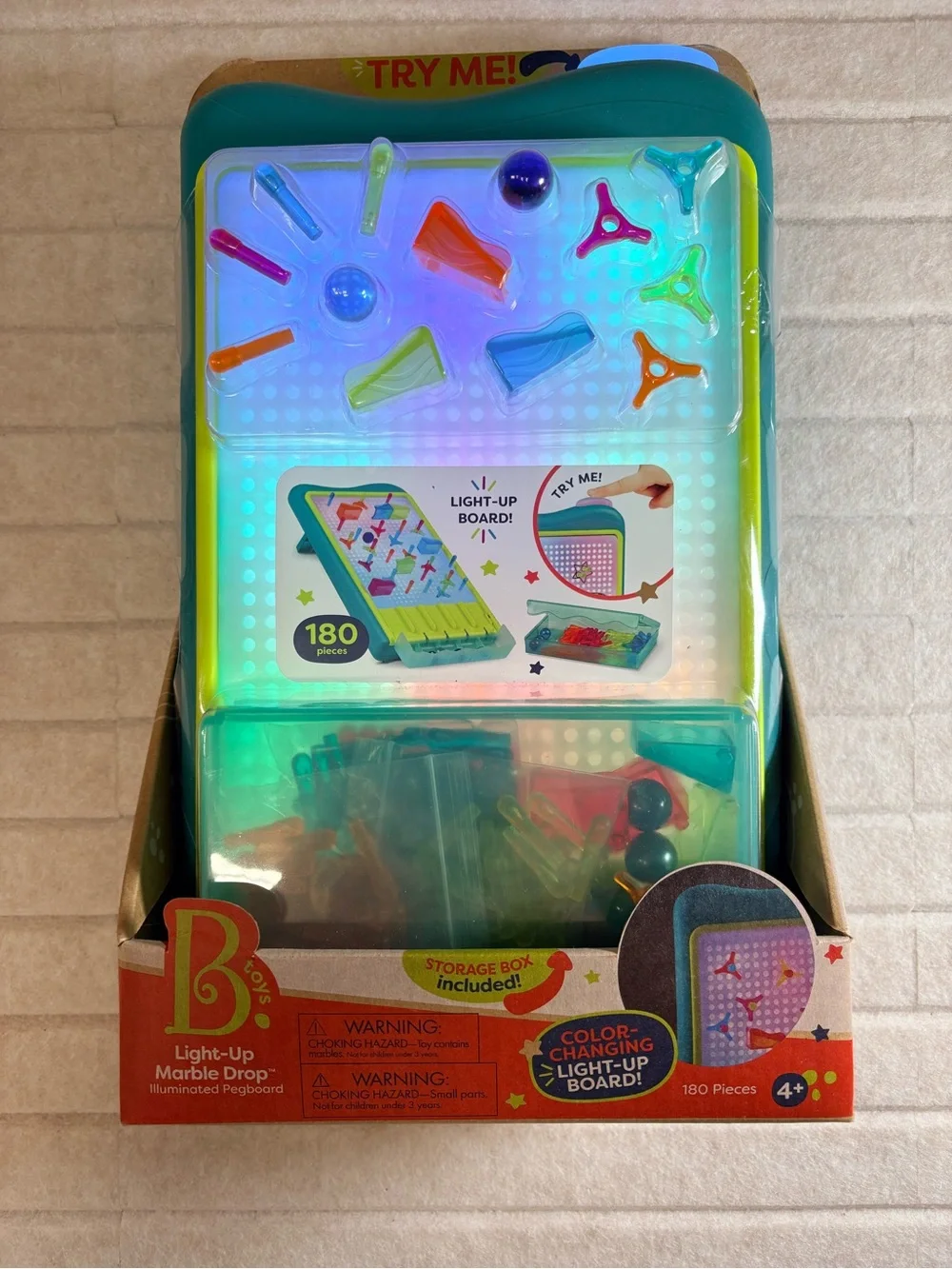 Light-Up Marble Drop Pegboard Toy - Teal Frame with Multicolor Pegs